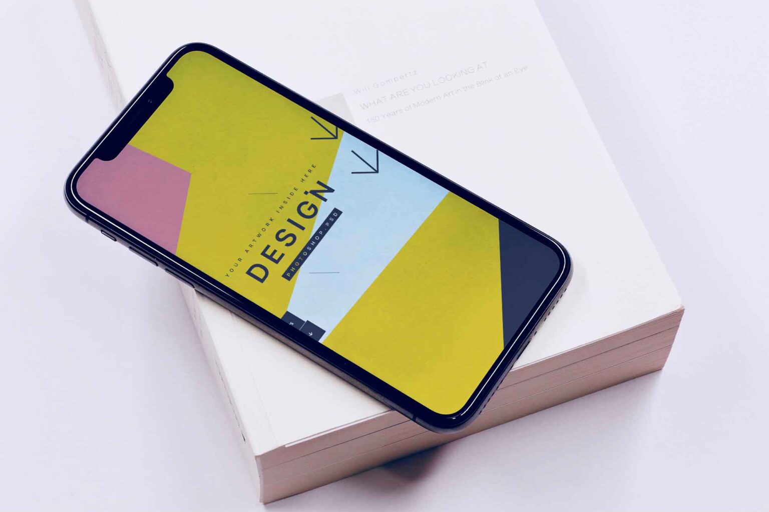 Iphone on book mockup download free resource